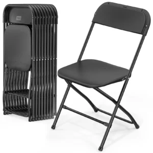 Guests seated on black and white vinyl folding chairs at an event